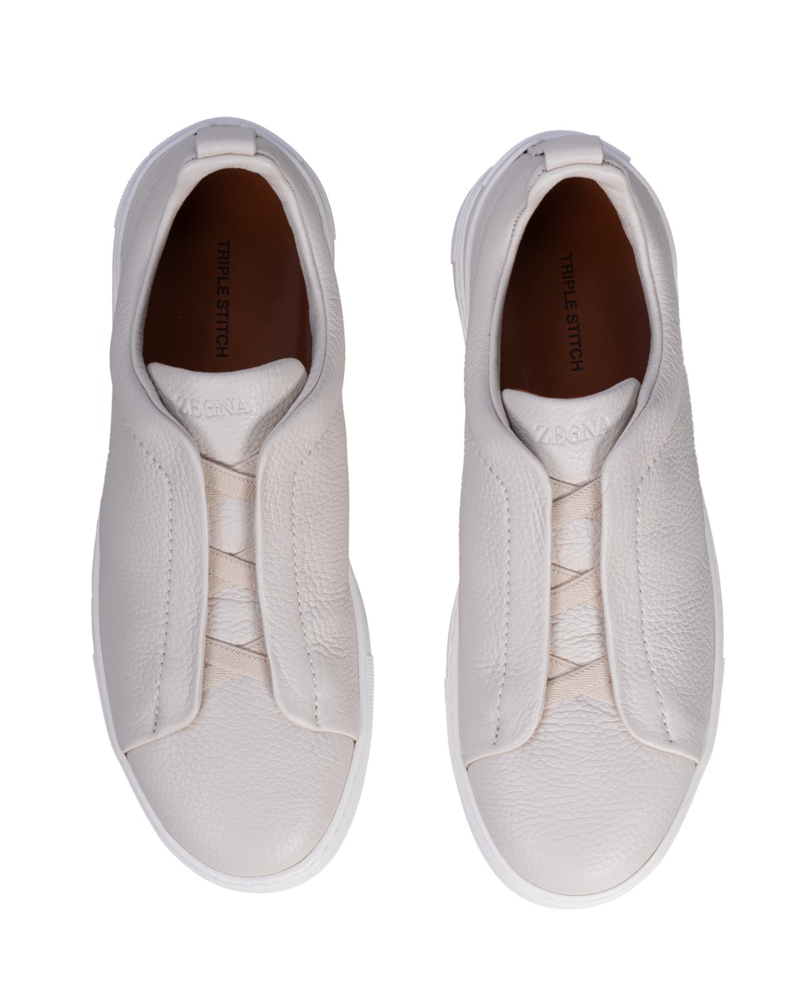 shop ZEGNA  Scarpa: Zegna sneakers Low Top Triple Stitch™ in pelle di cervo.
Tre elastici incrociati sulla tomaia.
Logo XXX sul tallone.
Fodera in pelle.
Suola in gomma.
Con sacchetto coordinato.
Composizione: 100% pelle di cervo.
Made in Italy.. LHCVO S4667Z-PAN number 9154733
